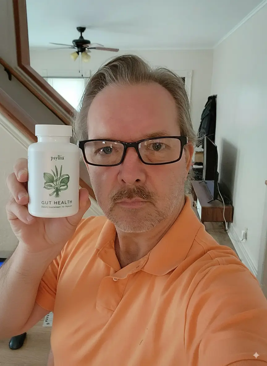 Robert holding his bottle of Psyllia